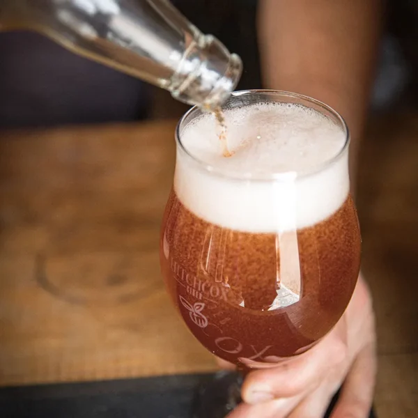 Hitchcox Cider bottle pouring